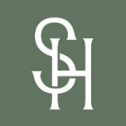 Spice House log - intertwined S and H on a green background